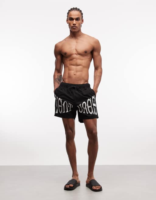 ASOS DESIGN swim shorts in mid length with placement print in black, 2 of 5