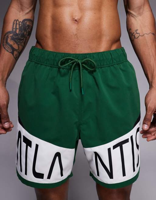 ASOS DESIGN swim shorts in mid length with placement print in green, 4 of 5