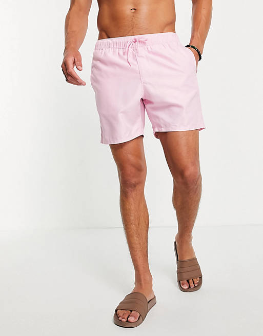 ASOS DESIGN swim shorts in pastel pink mid length