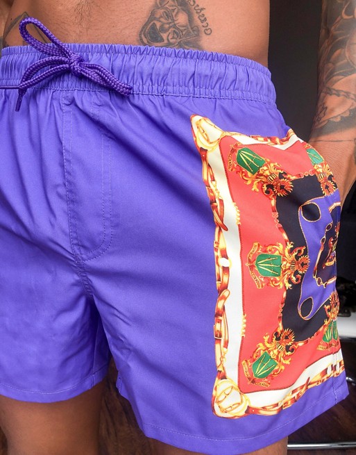 ASOS DESIGN swim shorts in purple with side print short length