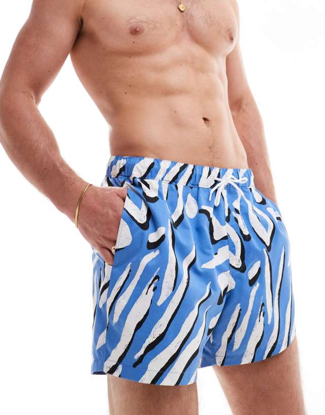 ASOS DESIGN - swim shorts in short length in animal print