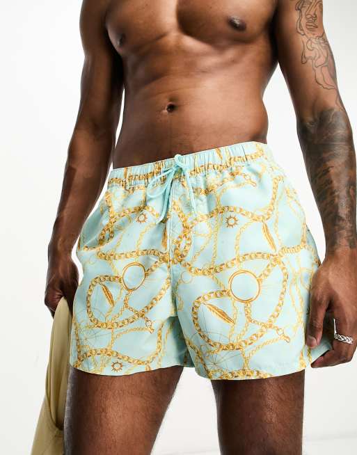 ASOS DESIGN swim shorts in short length with tequila print in beige - part  of a set