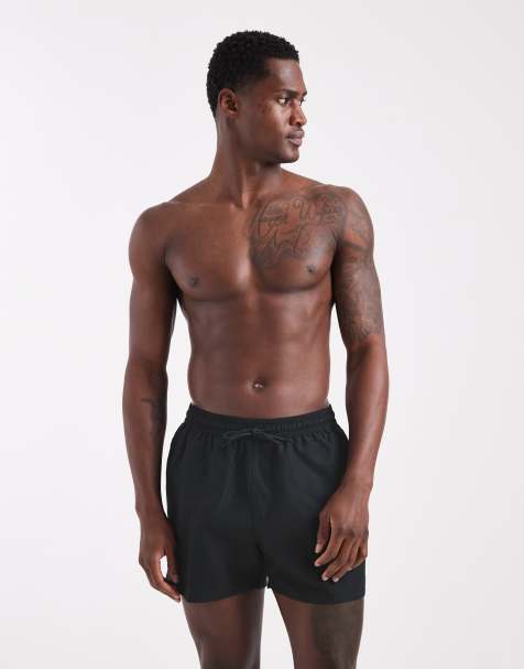 ASOS DESIGN swim shorts in short length in black