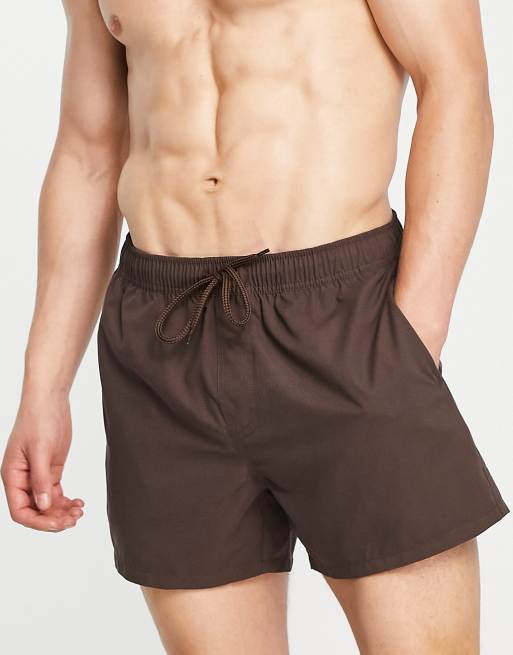 ASOS DESIGN swim shorts in short length in brown