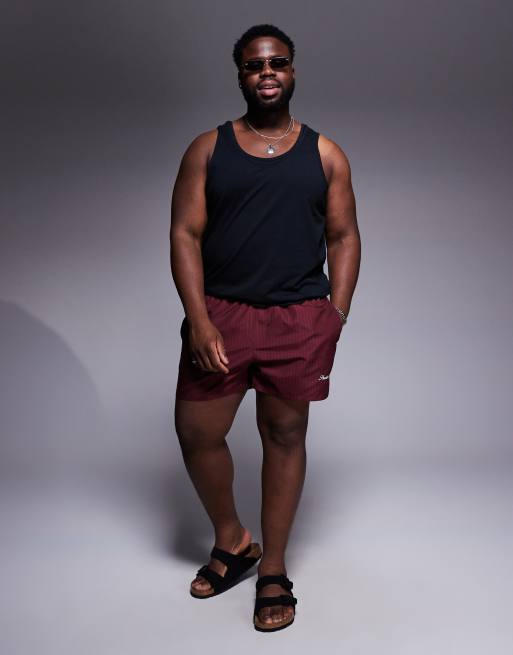 ASOS DESIGN swim shorts in short length in burgundy stripe with placement print, 2 of 4
