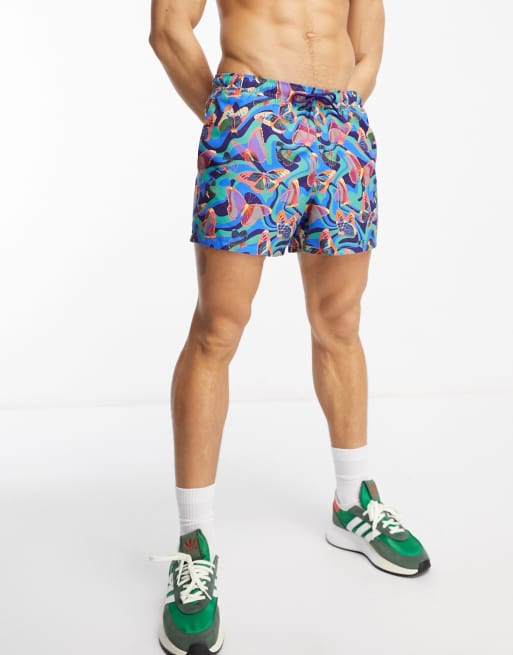 ASOS DESIGN swim shorts in short length in butterfly print ASOS