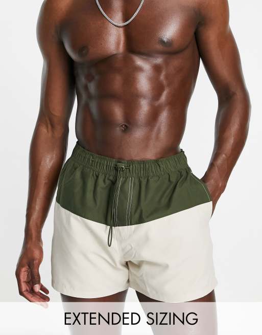 ASOS DESIGN swim shorts in short length in colour block in khaki and stone