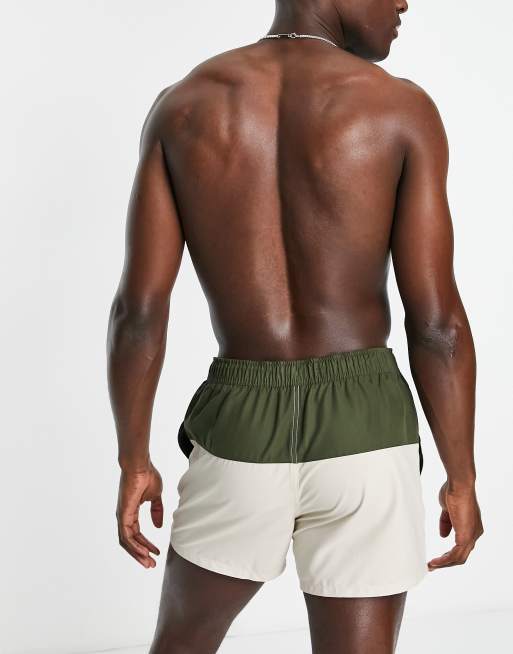 ASOS DESIGN swim shorts in short length in colour block in khaki and stone, 2 of 4