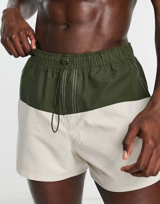 ASOS DESIGN swim shorts in short length in colour block in khaki and stone, 3 of 4
