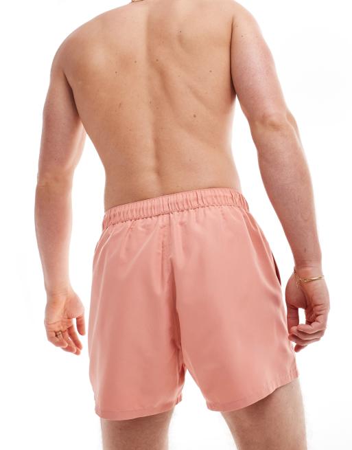 ASOS DESIGN swim shorts in short length in coral