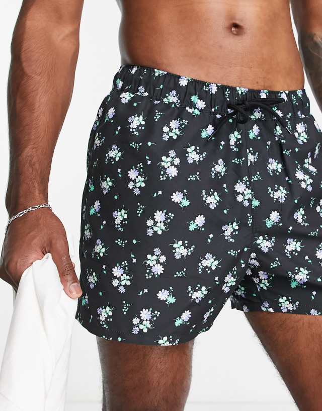 ASOS DESIGN swim shorts in short length in floral print