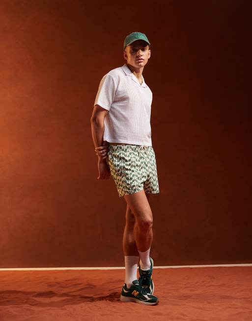 ASOS DESIGN swim shorts in short length in geo print 