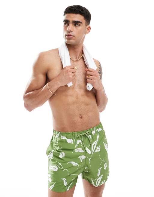 ASOS DESIGN swim shorts in short length in green floral print | ASOS