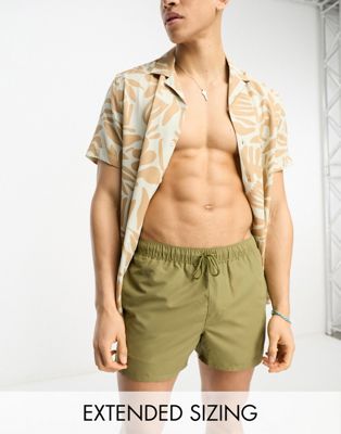 ASOS DESIGN swim shorts in short length in khaki