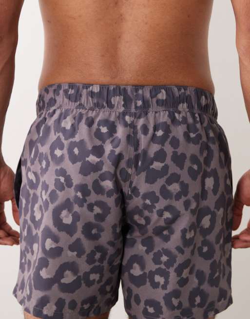 ASOS DESIGN swim shorts in short length in leopard print in brown, 4 of 5