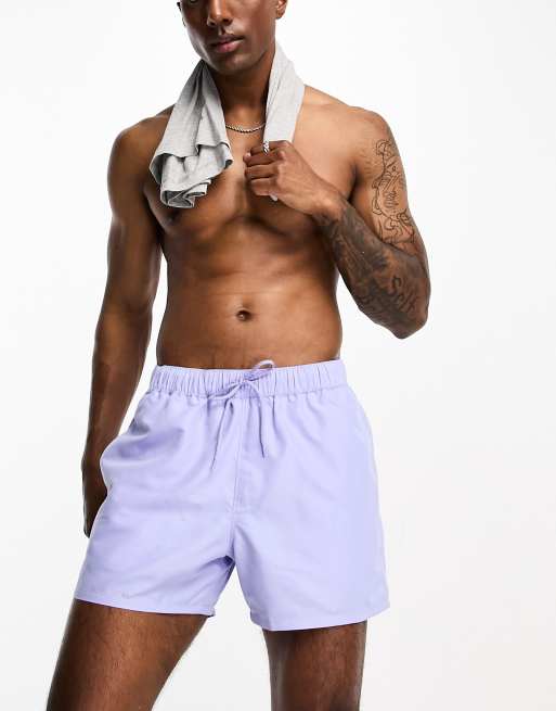 ASOS DESIGN swim shorts in short length with contrast waistband in