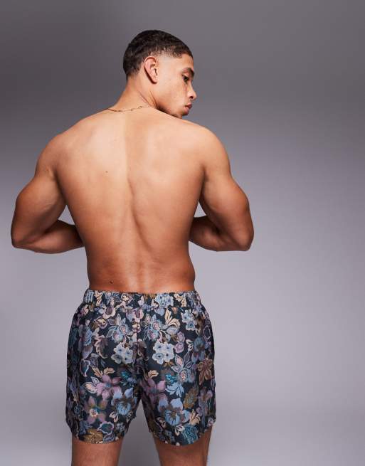 ASOS DESIGN swim shorts in short length in navy floral print