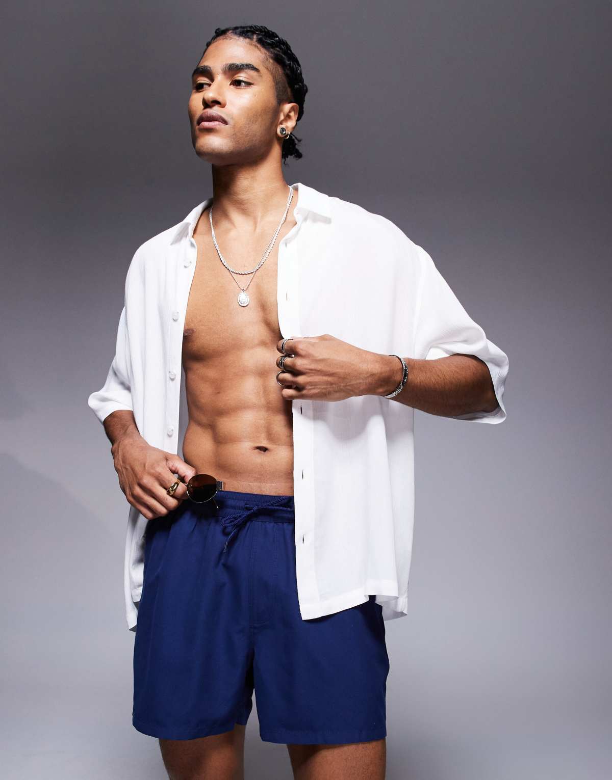 ASOS DESIGN swim shorts in short length in navy