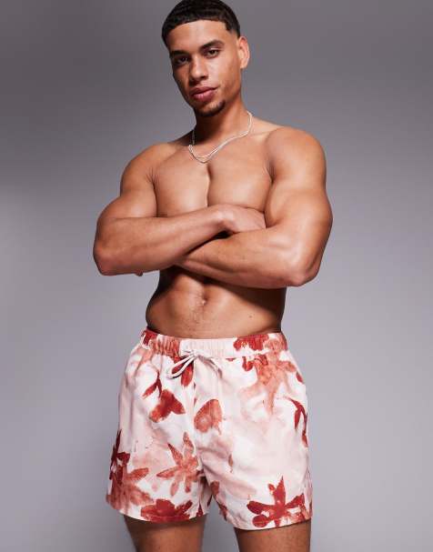 ASOS DESIGN swim shorts in short length in pink floral print - view 1
