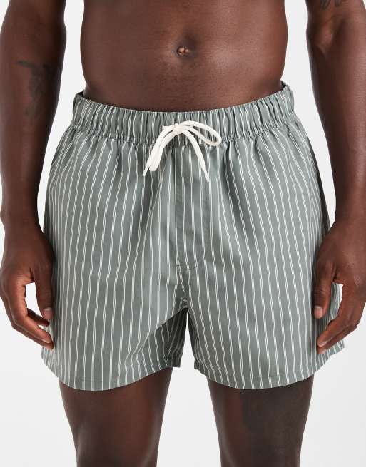 ASOS DESIGN swim shorts in short length in sage green stripe, 4 of 5