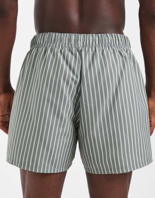 ASOS DESIGN swim shorts in short length in sage green stripes, 5 of 5