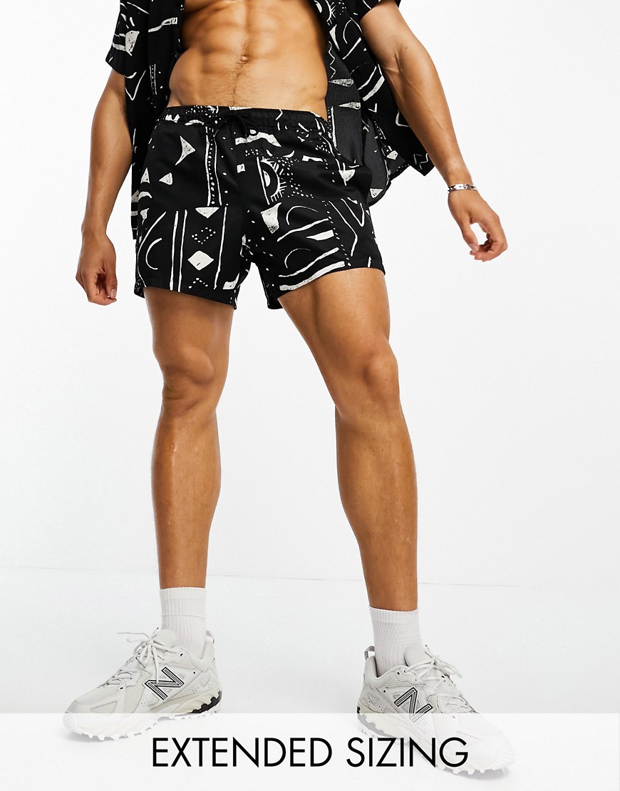ASOS DESIGN swim shorts in short length with abstract print - part of a set-Black