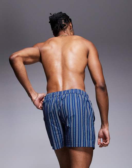 ASOS DESIGN swim shorts in short length with blue stripe, 4 of 4
