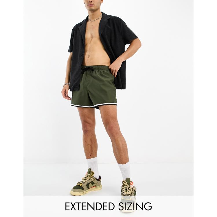 ASOS DESIGN swim shorts in short length with cargo pocket and contrast  binding in khaki