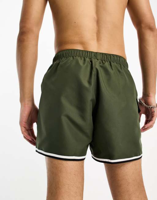 ASOS DESIGN swim shorts in short length with cargo pocket and contrast binding in khaki, 2 of 4