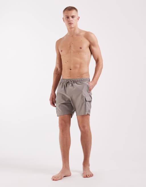ASOS DESIGN swim shorts in short length with cargo pockets in beige, 2 of 5