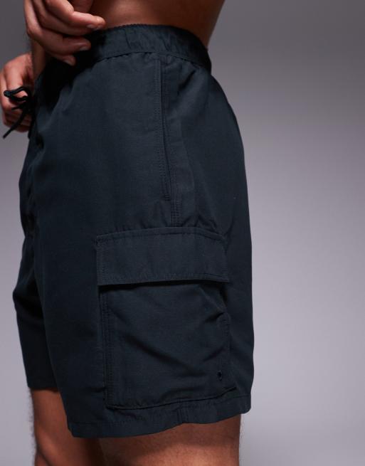 ASOS DESIGN swim shorts in short length with cargo pockets in black , 2 of 4