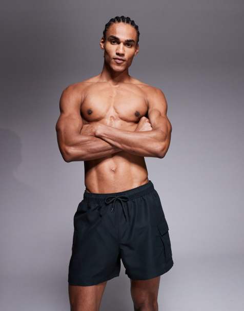 ASOS DESIGN swim shorts in short length with cargo pockets in black