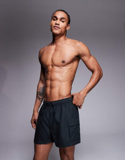 ASOS DESIGN swim shorts in short length with cargo pockets in black, 3 of 5