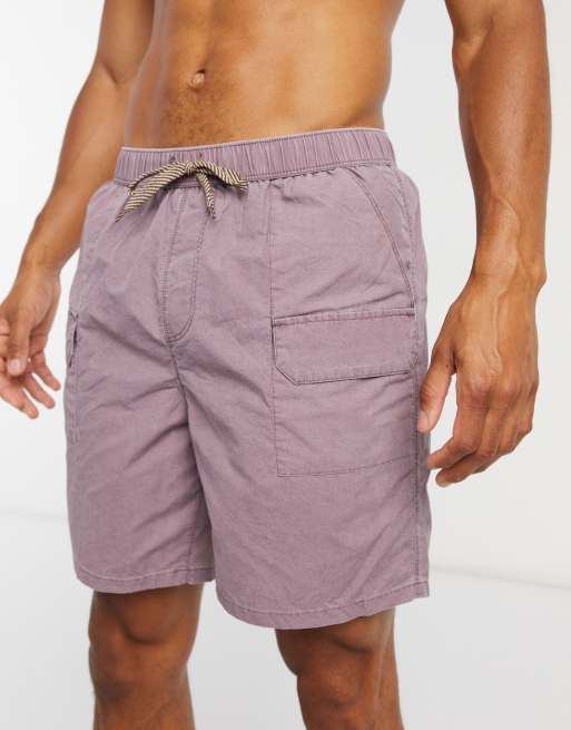 ASOS DESIGN swim shorts in short length with cargo pockets in pink acid wash