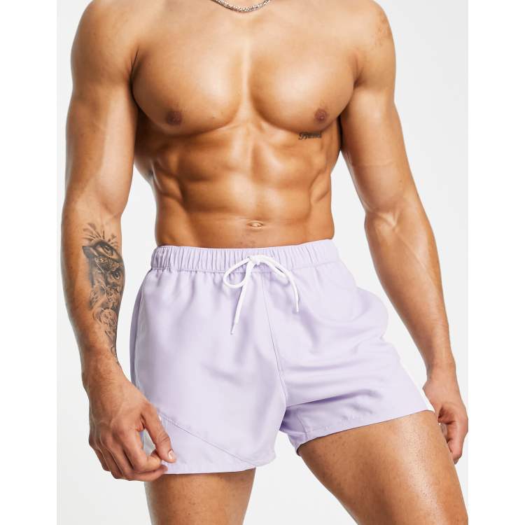 ASOS DESIGN swim shorts in short length with colour block in purple