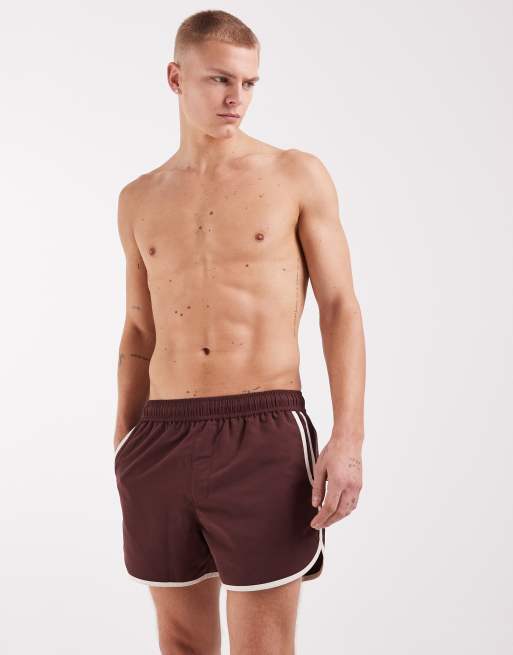 ASOS DESIGN swim shorts in short length with contrast binding in brown, 3 of 5