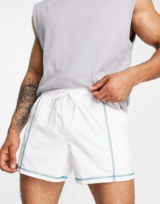 ASOS DESIGN swim shorts in short length with contrast waistband in