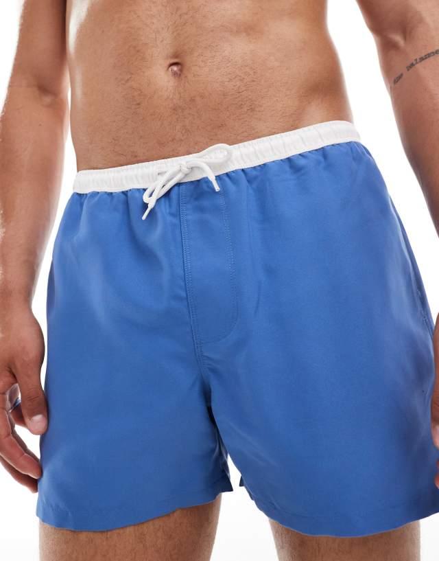 ASOS DESIGN - swim shorts in short length with contrast waistband in blue