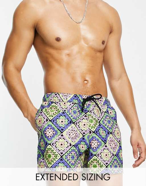 ASOS DESIGN swim shorts in short length with crochet print in black
