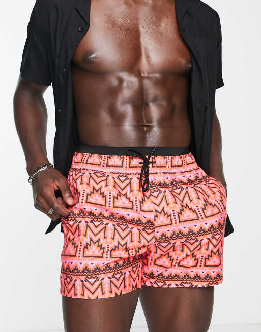 ASOS DESIGN swim shorts in short length with double waistband and retro print in pink