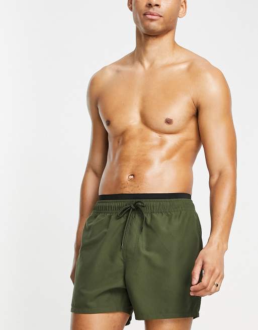 ASOS DESIGN swim shorts in short length with double waistband in khaki