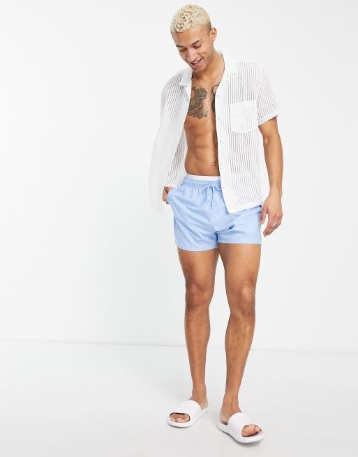 ASOS DESIGN swim shorts in short length with contrast waistband in