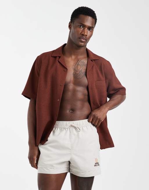 ASOS DESIGN swim shorts in short length with embroidery in beige, 2 of 6
