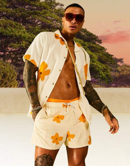 ASOS DESIGN swim shorts in short length with floral print in beige - part of a set