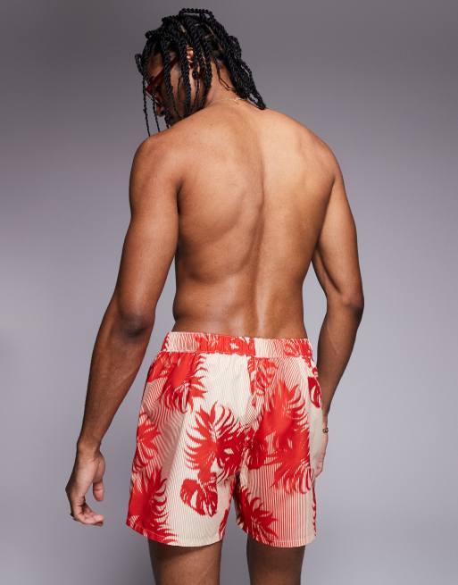 ASOS DESIGN swim shorts in short length with floral print in red, 4 of 4