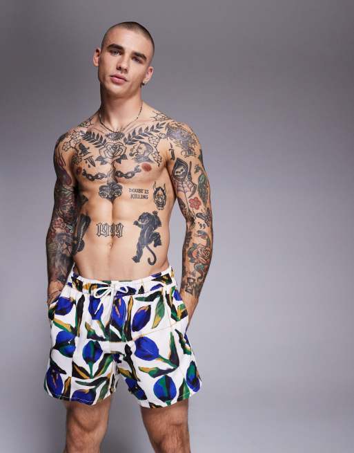 ASOS DESIGN swim shorts in short length with floral print in white, 3 of 4