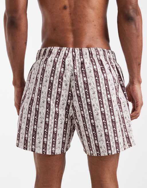 ASOS DESIGN swim shorts in short length with floral stripe in brown, 5 of 5