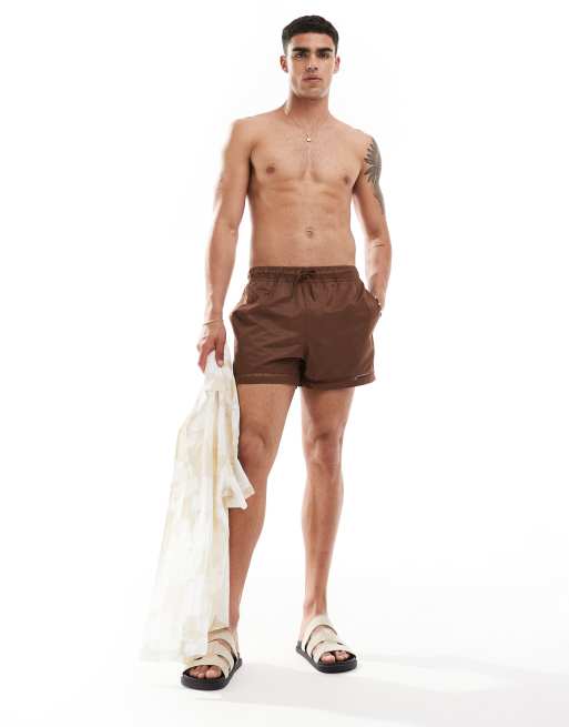 ASOS DESIGN swim shorts in short length with hem details in brown ASOS