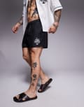 [ASOS DESIGN] ASOS DESIGN swim shorts in short length with palm tree in embroidery in black (part of a set) XS BLACK