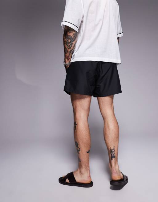 ASOS DESIGN swim shorts in short length with palm tree in embroidery in black - part of a set